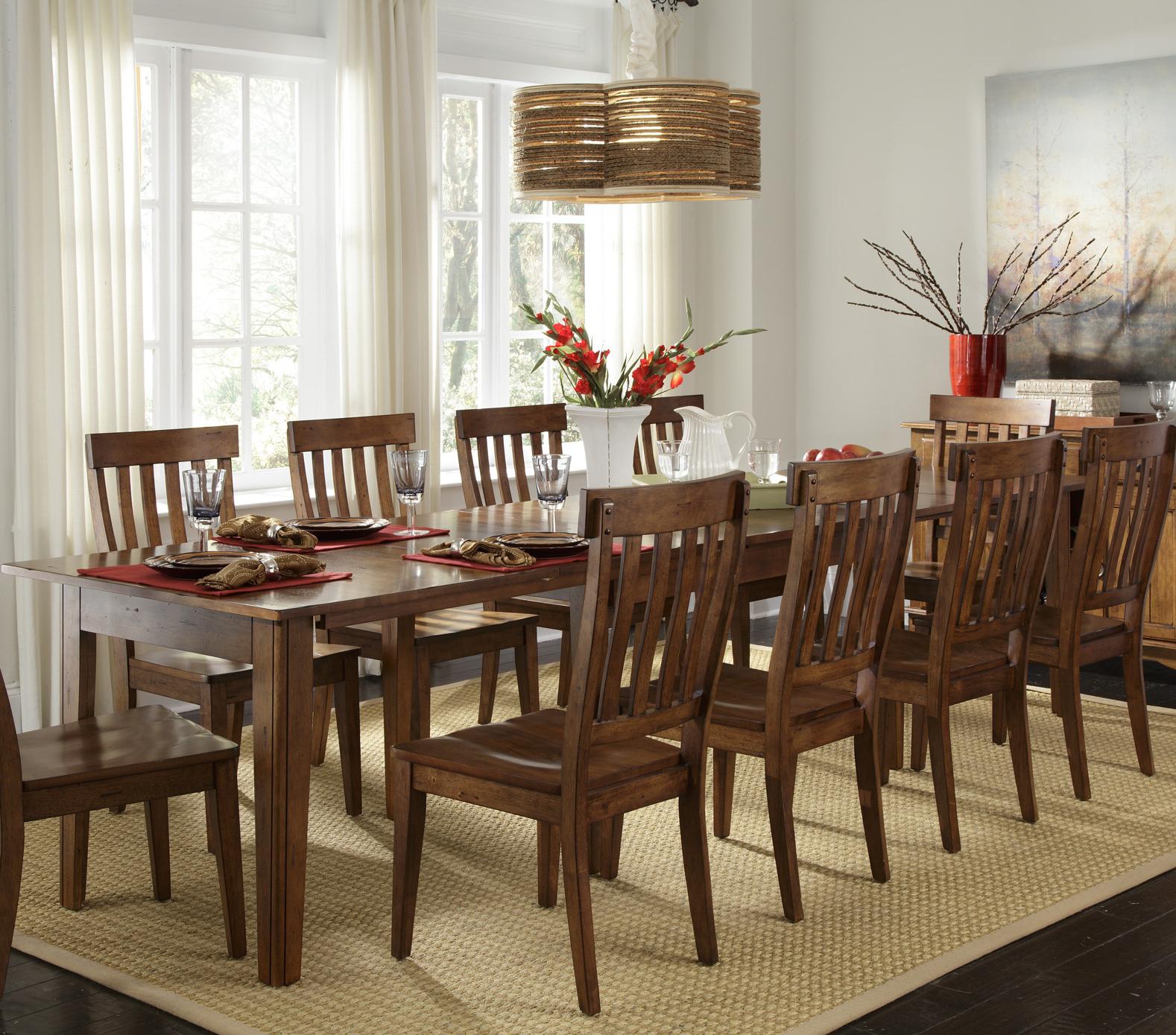 Extendable dining table with best sale self storing leaves